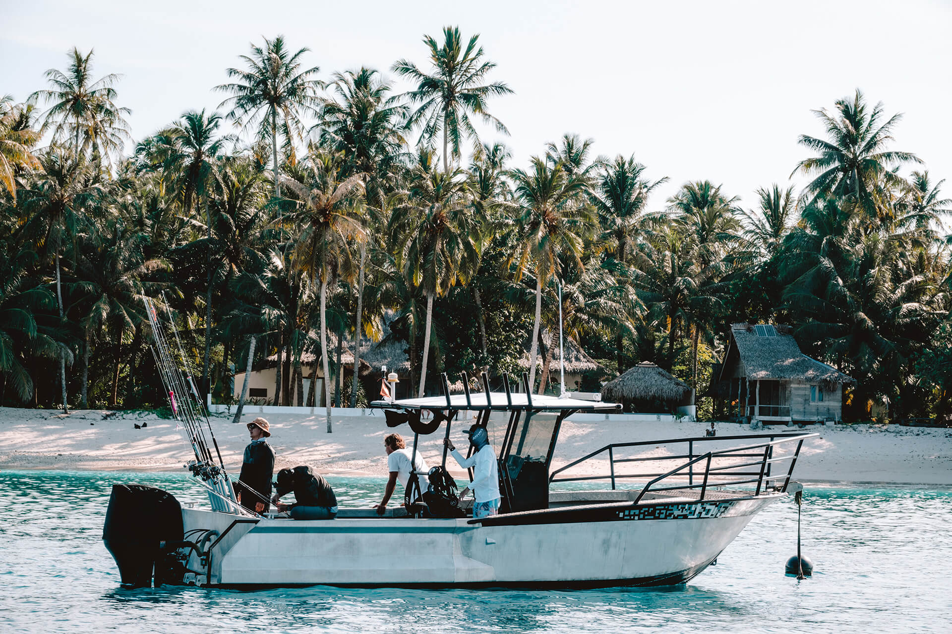 Villa Onus custom built Morey 780 Interceptor moored just of the beach in front of Villa Onu Mentawai.